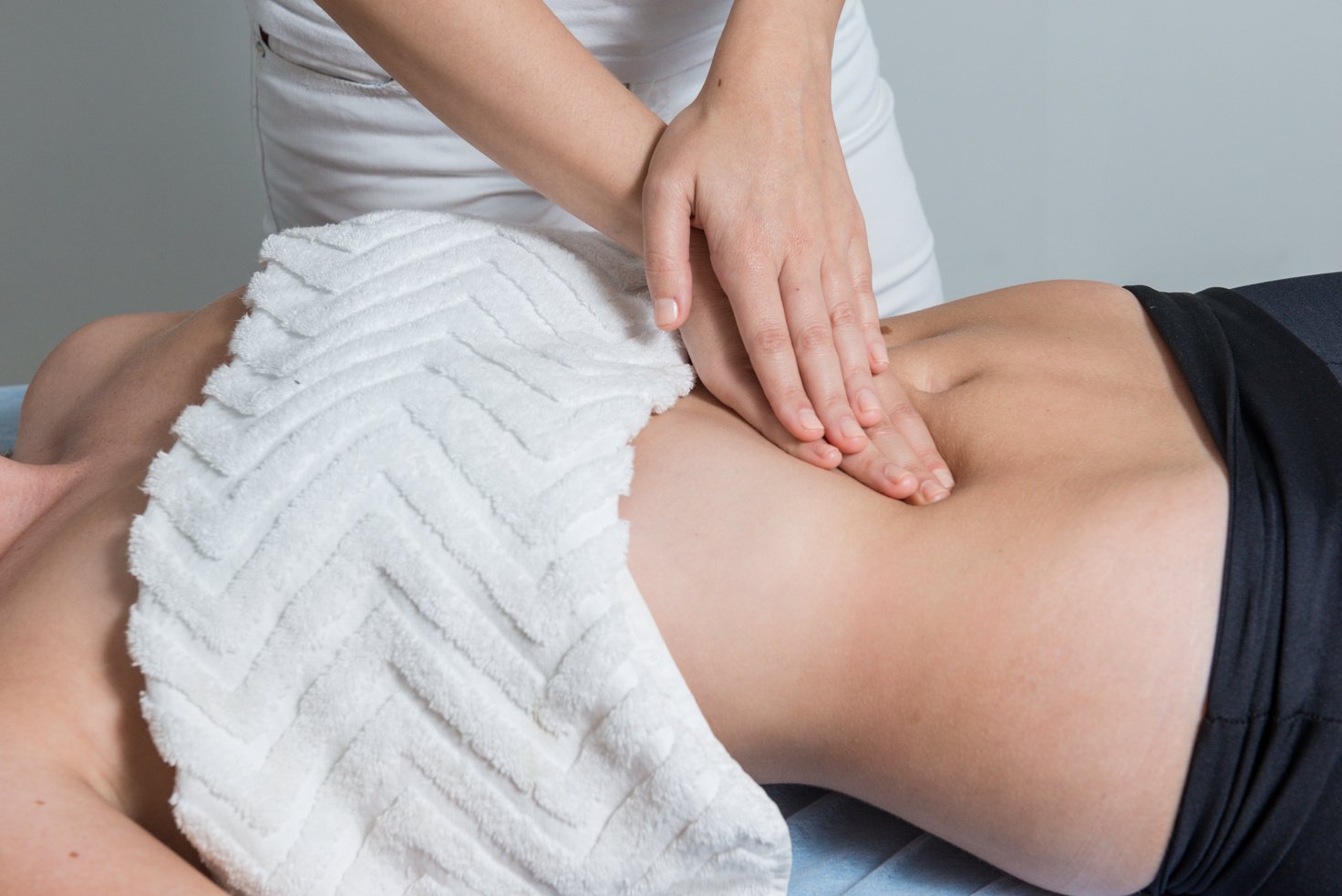 Beautiful blond woman receiving modeling massage. Drainage